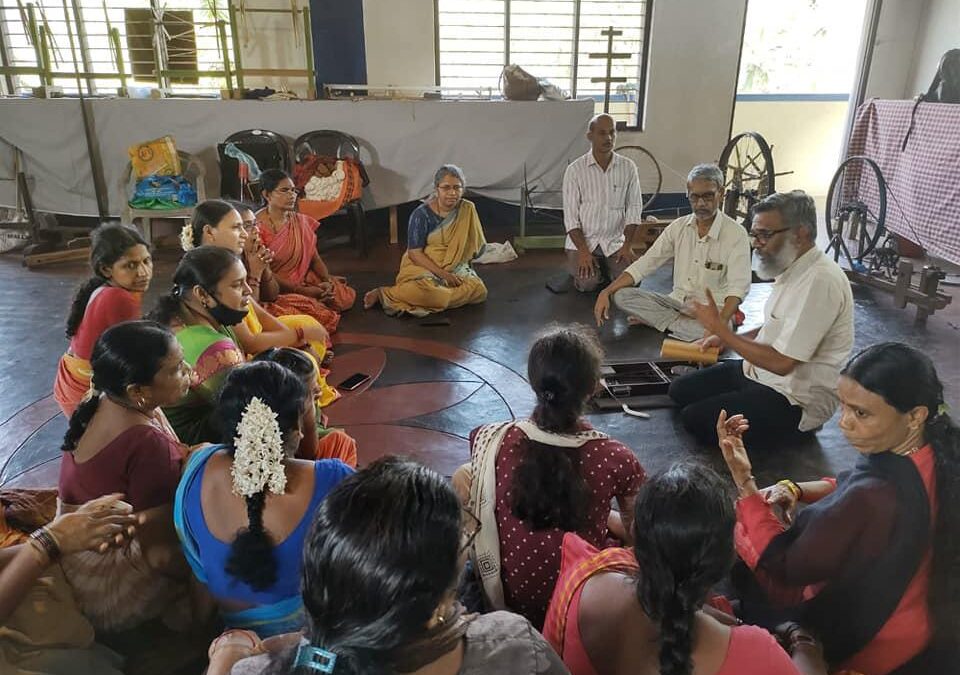 Demonstrated spinning using box charaka to weavers